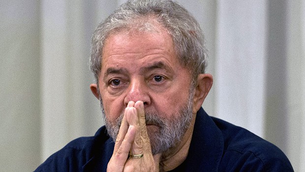 Former Brazilian President (2003-2011) Luiz Inacio Lula da Silva gestures during a meeting with the Workers' Party (PT) members in Sao Paulo, Brazil on March 30, 2015 AFP PHOTO / Nelson ALMEIDA (Photo credit should read NELSON ALMEIDA/AFP/Getty Images)