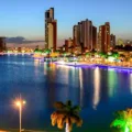 Campina Grande, Paraiba, Brazil on December 12, 2013. Night view of the old weir with buildings in the city center in the background.