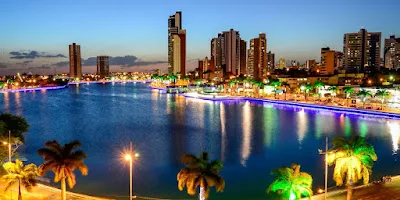 Campina Grande, Paraiba, Brazil on December 12, 2013. Night view of the old weir with buildings in the city center in the background.